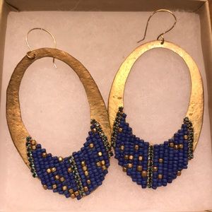 gold dangle earrings with blue beading